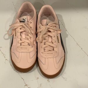 Puma Blush Pink Sneakers with Gum Sole and Blue Stripe.